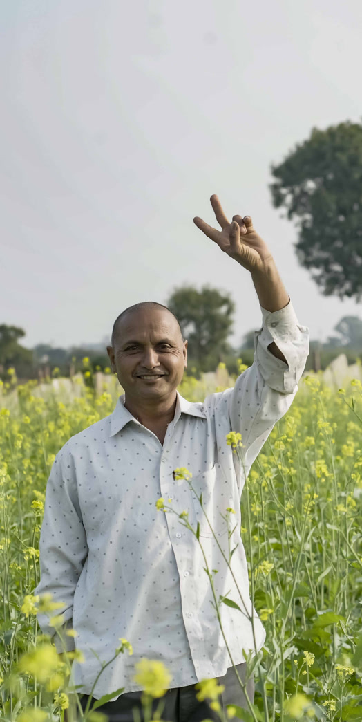 Farmer checking crops in the field