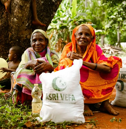 Women farmers with their agricultural supplies